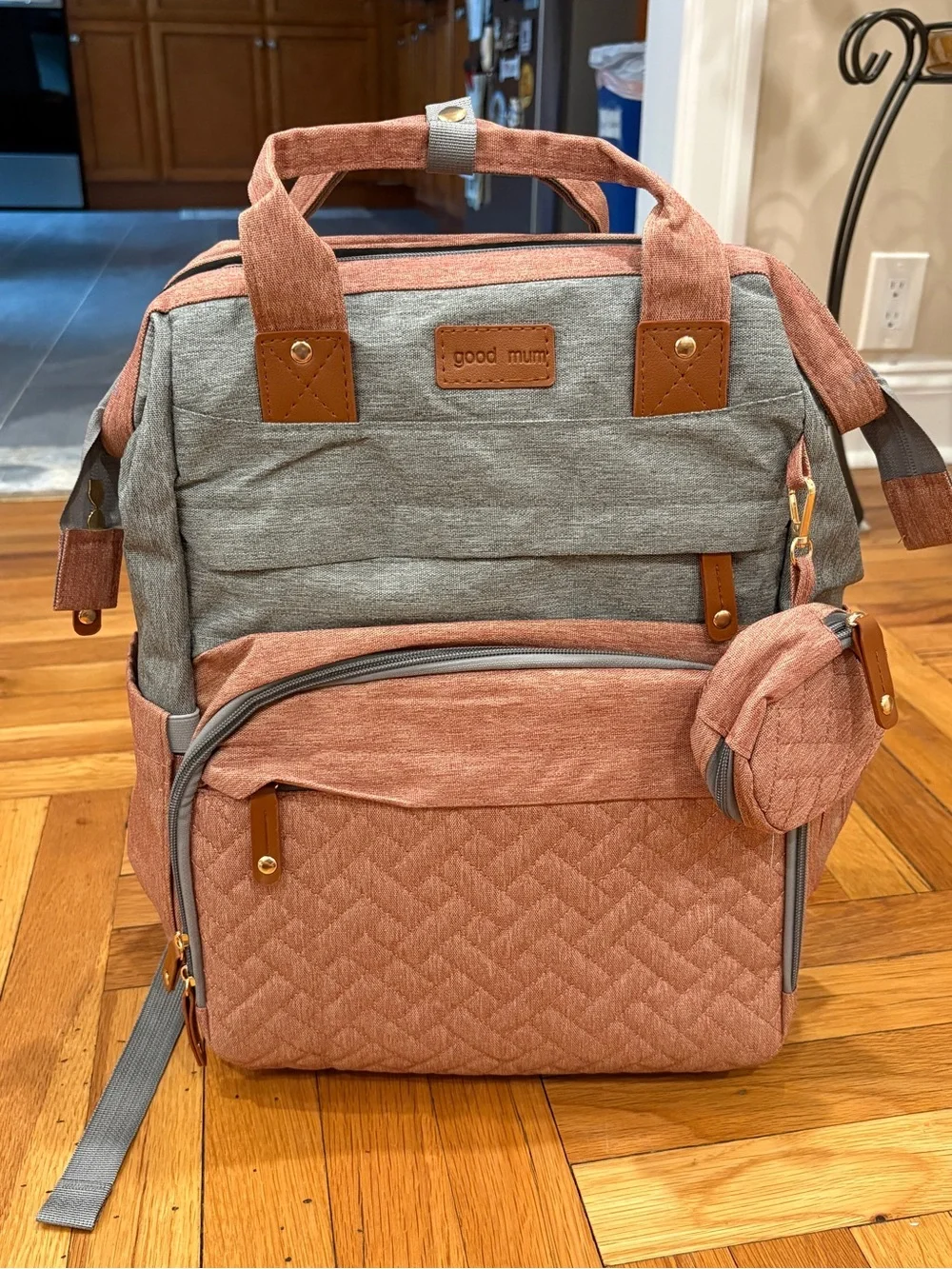 Brand new diaper bag, folds out with a bed